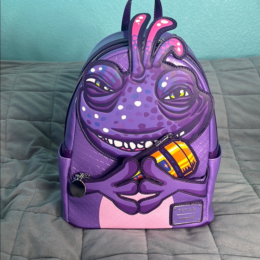 Loungefly Monsters In. Randall Boggs Pixar limited edition backpack.
